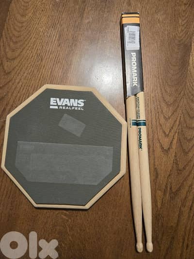 realfeel drumpad and PROMARK Drum sticks