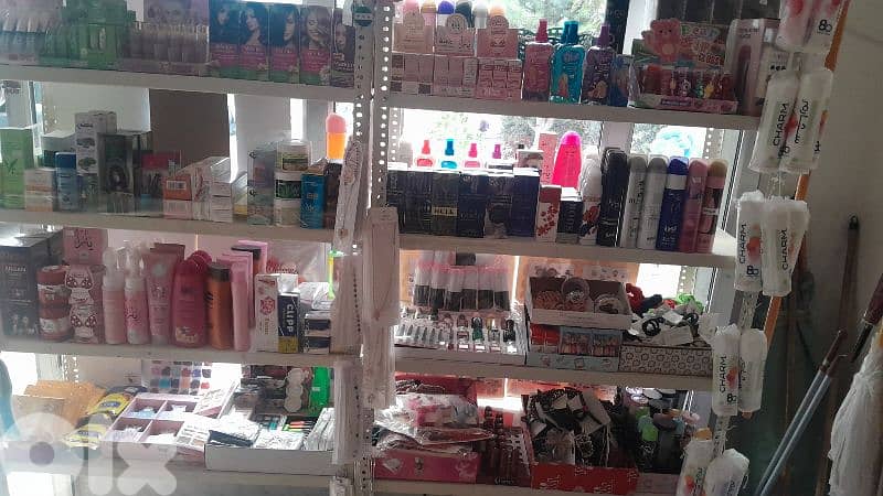 محل وان $ للبيع 0