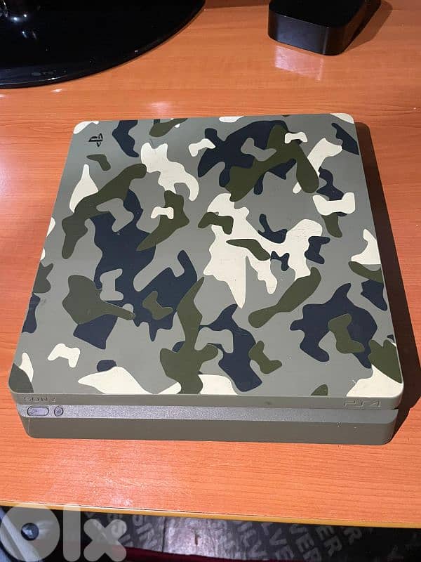 للبيع: بلايستيشن 4 سليم – إصدار مموّه (Camo Edition) بحالة ممتاز 5