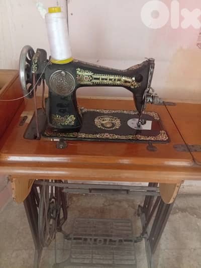 antique old LION sewing machine