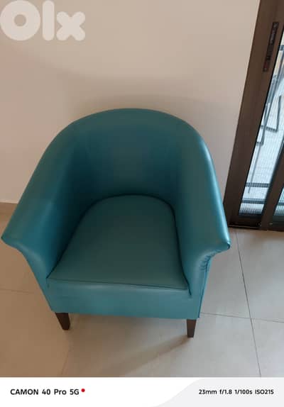 Single seat turquoise chair
