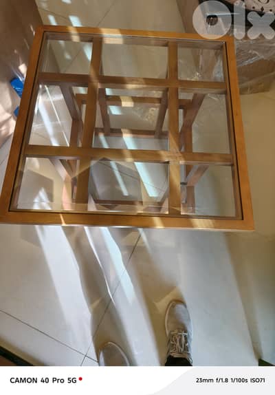 Square wood and glass coffee table Square wood and glass coffee table