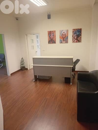 for rent office Fully furnished in a commercial building sin el fil.