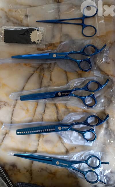 طقم مقصات للحيوانات  الأليفة ماركة ألمانية.  جديد وأصلي ٥ مقصات