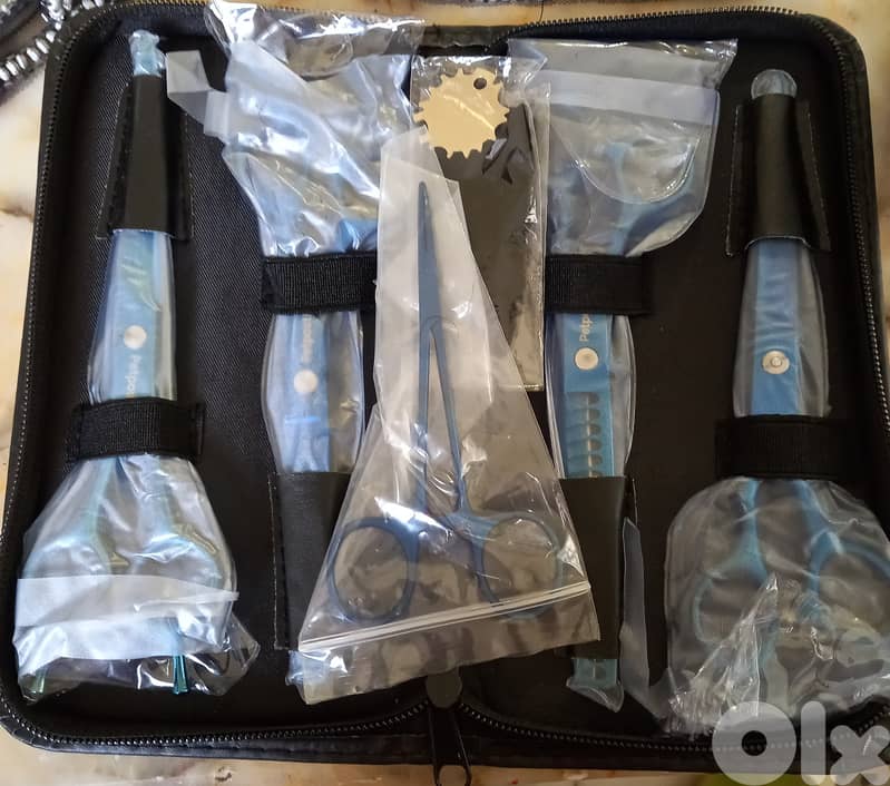 طقم مقصات للحيوانات  الأليفة ماركة ألمانية.  جديد وأصلي ٥ مقصات 1