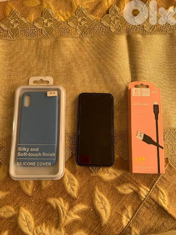 تلفون أيفون xs مغير شاشة بلا فيس أيدي مستعمل نضيف السعر 100$ 1