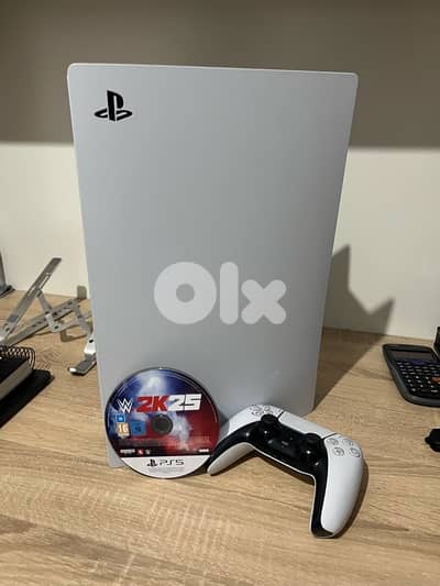 Sony ps5 + controller + WWE2k25