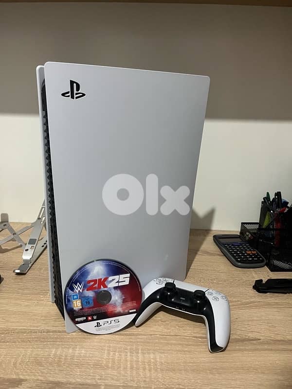 Sony ps5 + controller + WWE2k25 1