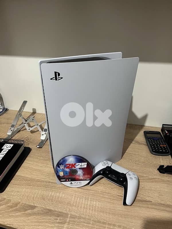 Sony ps5 + controller + WWE2k25 2