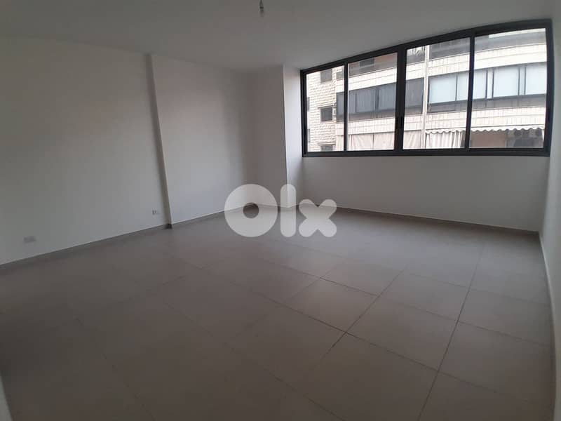 Ain El Remmaneh/ Apartment for sale + Terrace - عين الرمانة/ شقة للبيع 0