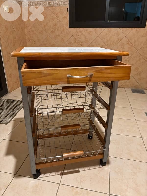 4 plastic chairs, 1 table, 1 vegetables basket with drawers 1