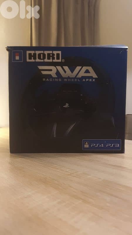 PS4 Slim 1TB | 3 controllers | 14 games | Apex driving wheel 2