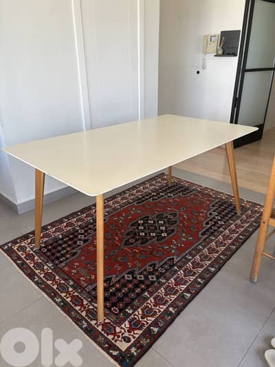 White wooden table with scratches