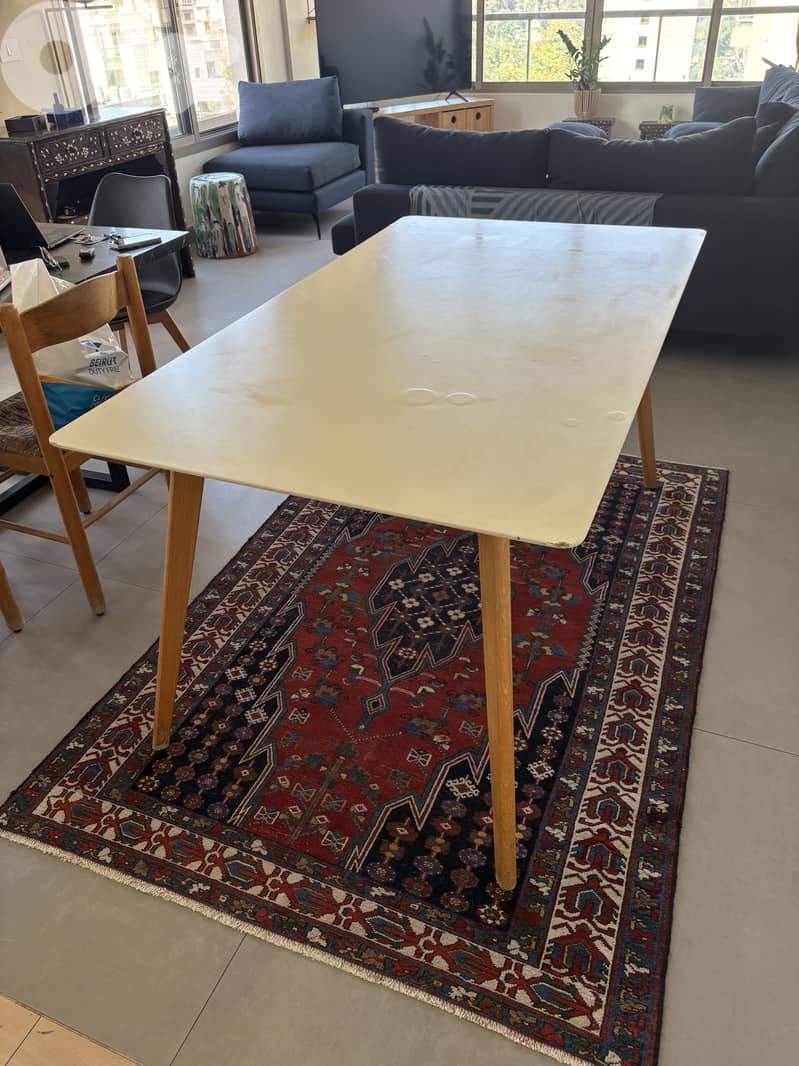 White wooden table with scratches 1
