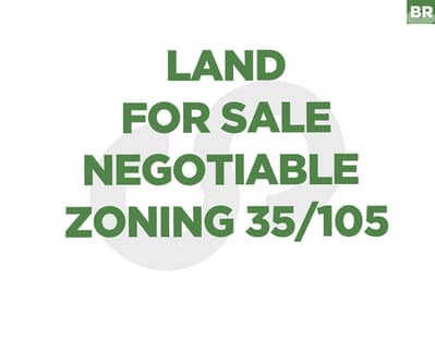 prime land is located on the main road in Amyoun REF#BR130146