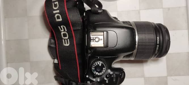Canon 550D 18MP DSLR body with 18-55 lens battery and charger