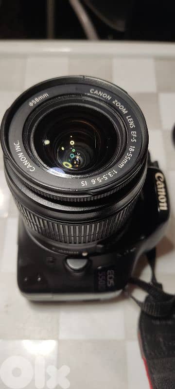 Canon 550D 18MP DSLR body with 18-55 lens battery and charger 1