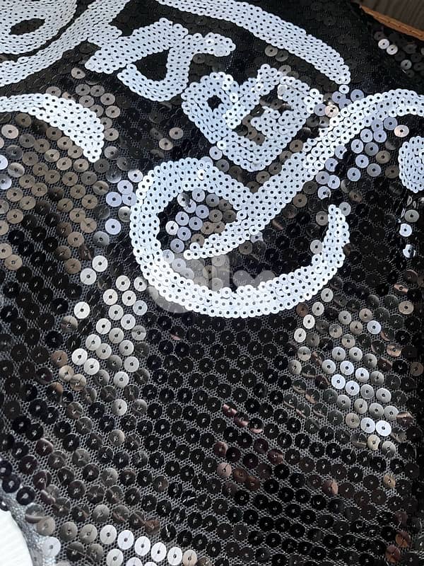 SEQUINED TOP NEVER WORN 7