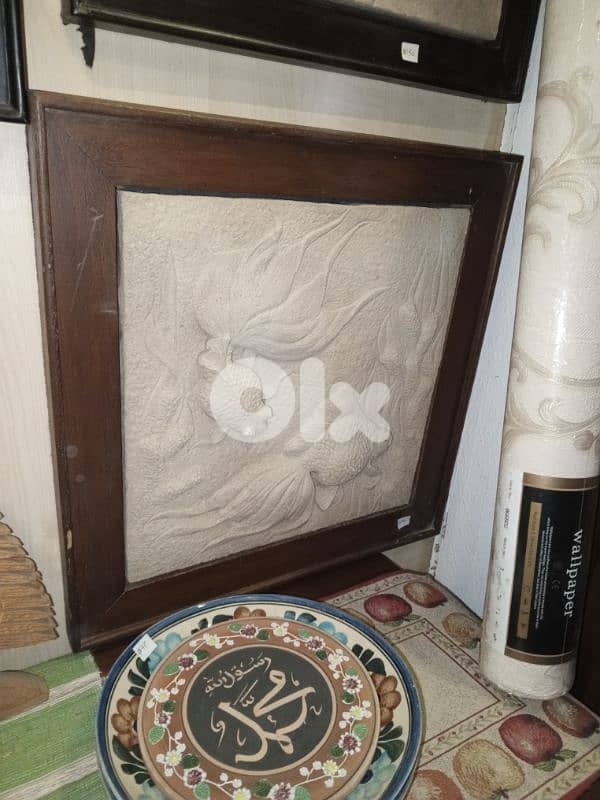 fish framed stone sculpture 0