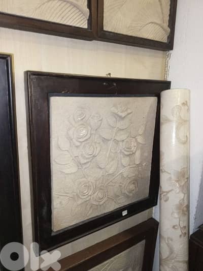 roses framed stone sculpture