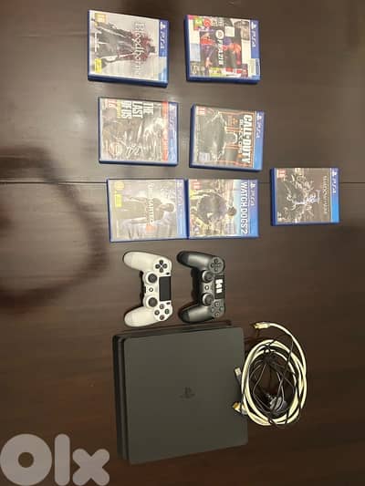 PS4 CONSOLE USED WITH 7 GAMES