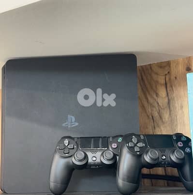 PS4 Slim with 2 joysticks and Cd  super clean like new