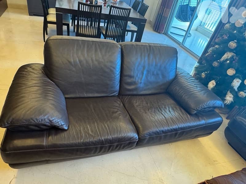 2 real leather sofas 1