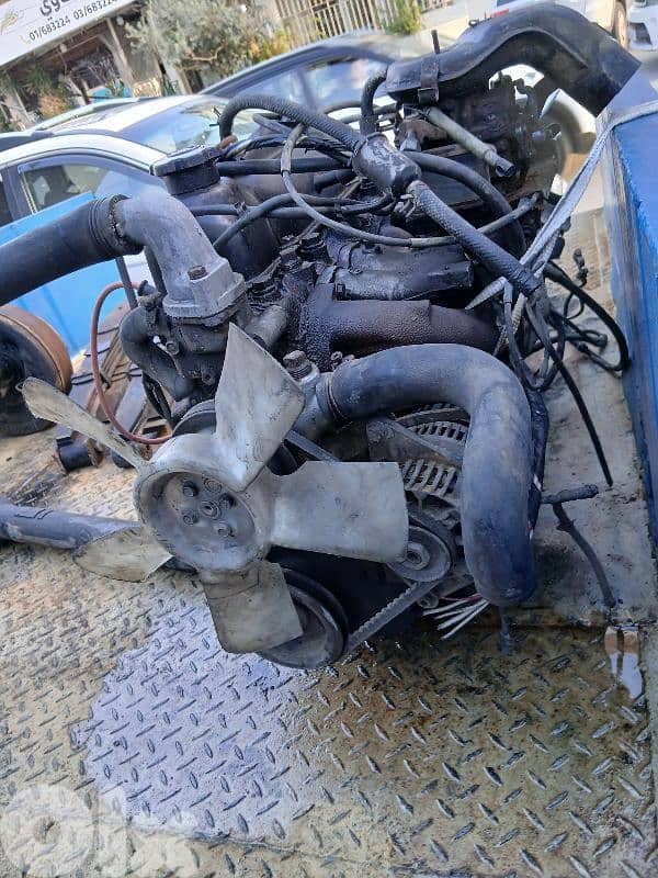 mecaniq kemil pikup Toyota dayna 5R moteur vitessew radiator kemlin 3