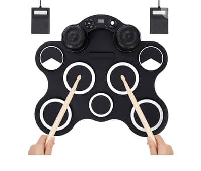 Rollup digital drums with speakers and two pedals