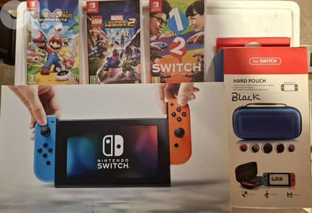 Nintendo switch + accessories + 3 games