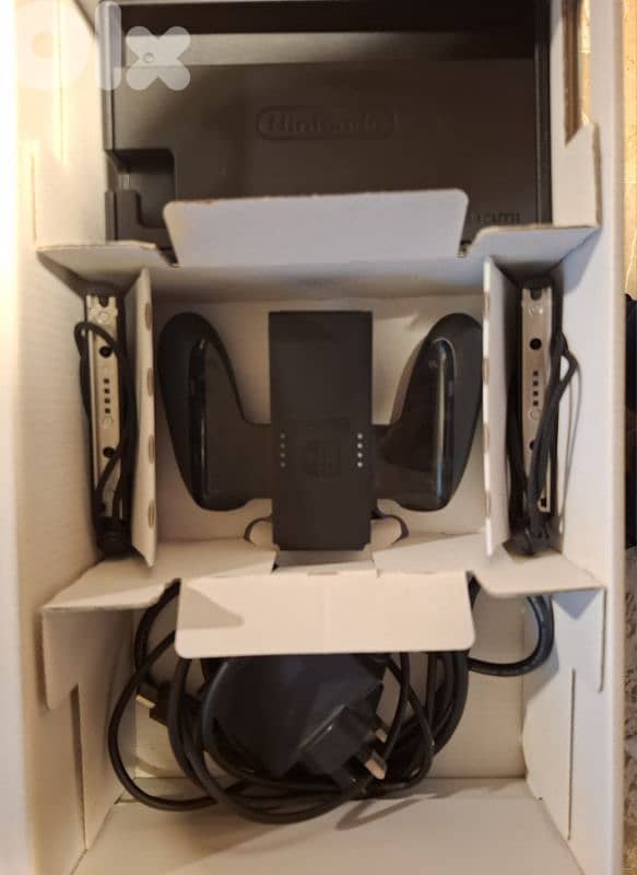 Nintendo switch + accessories + 3 games 3