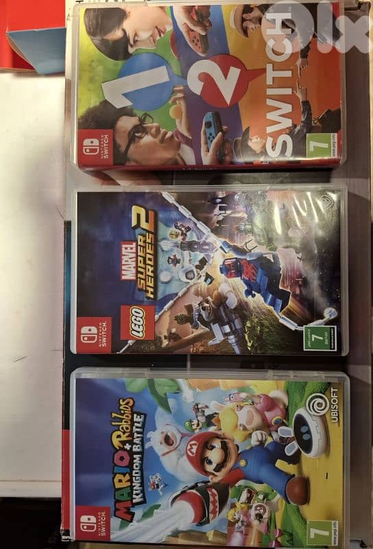 Nintendo switch + accessories + 3 games 4