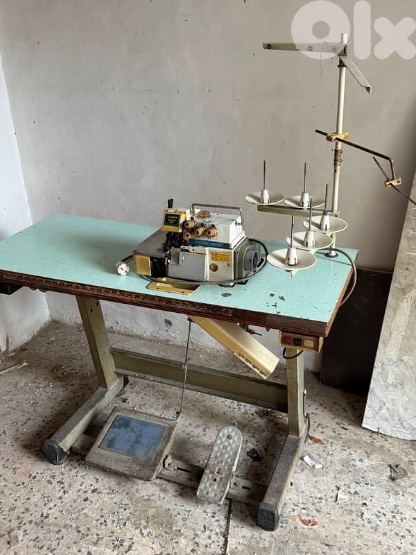 مكنة خياطة حبكة خمس أُبر 0