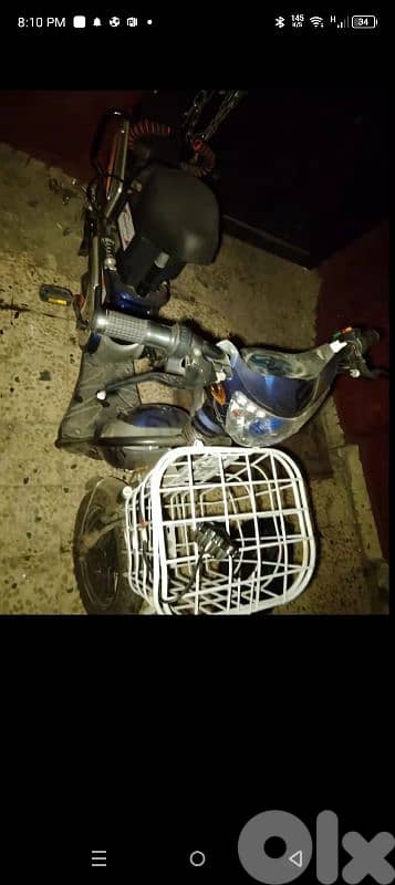 electric moto with charger + owl spot 1