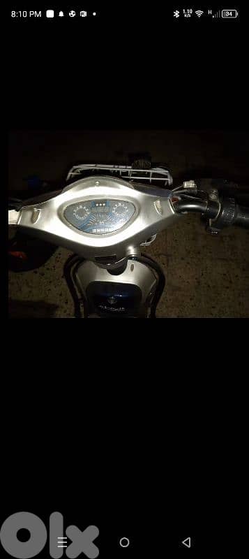 electric moto with charger + owl spot 3