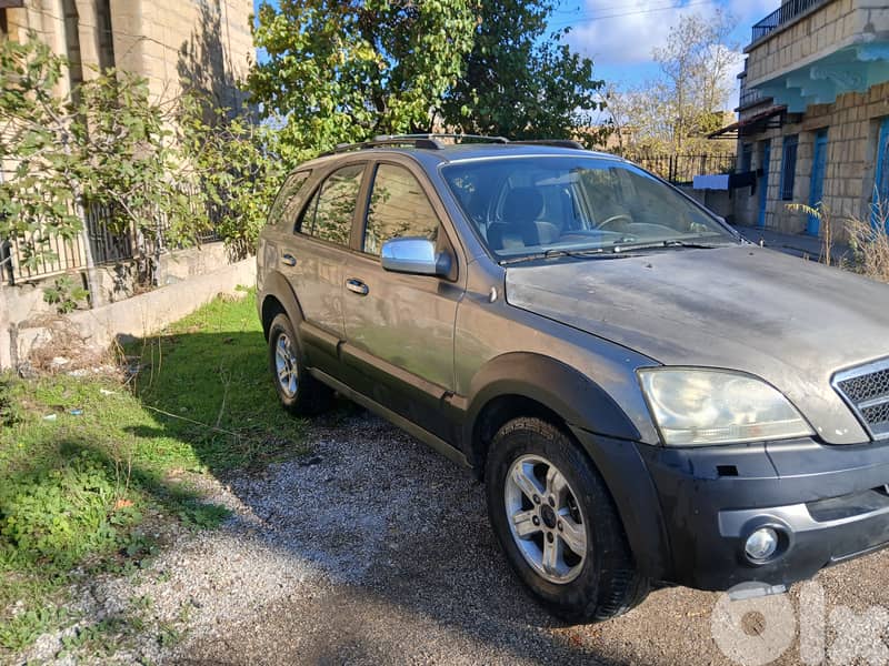 Kia.    Sorento.   2003.4x4.  V6 0