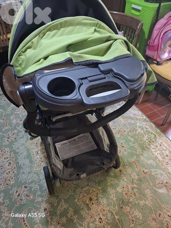 عرباية مع كرسي سيارة للبيبي 6