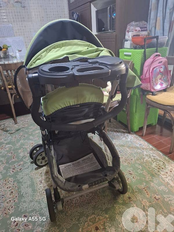 عرباية مع كرسي سيارة للبيبي 7