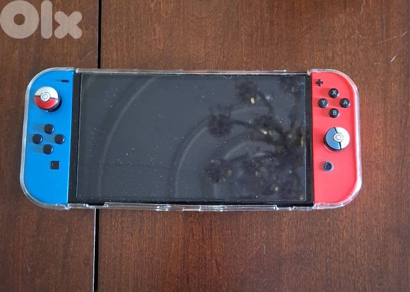 Nintendo switch Oled + Case + Picachu house case + Original charger 0