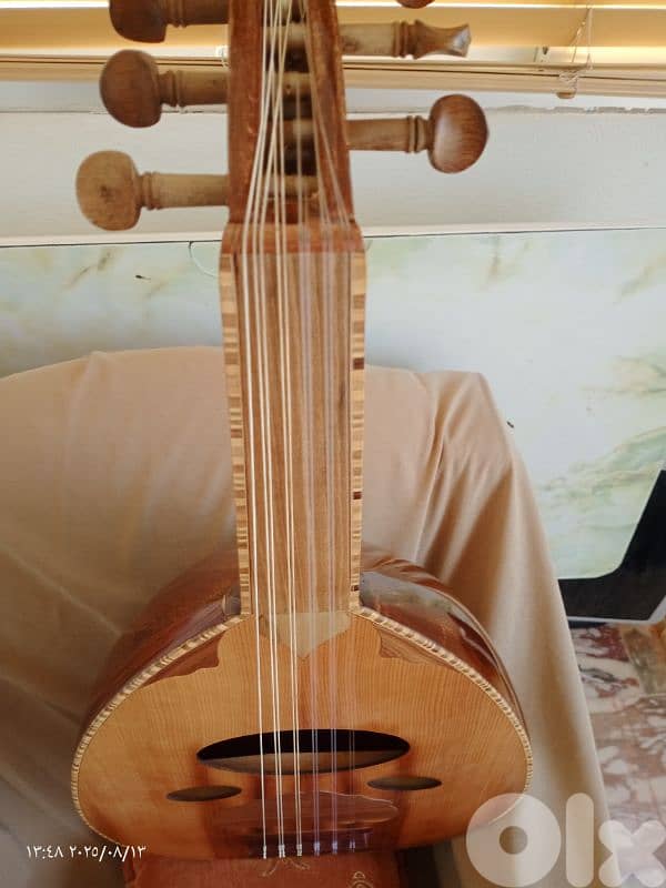 عود جديد مع حقيبة جلد وريش جميل جدا بالصوت والشكل والصناعة بسعر مناسب 6