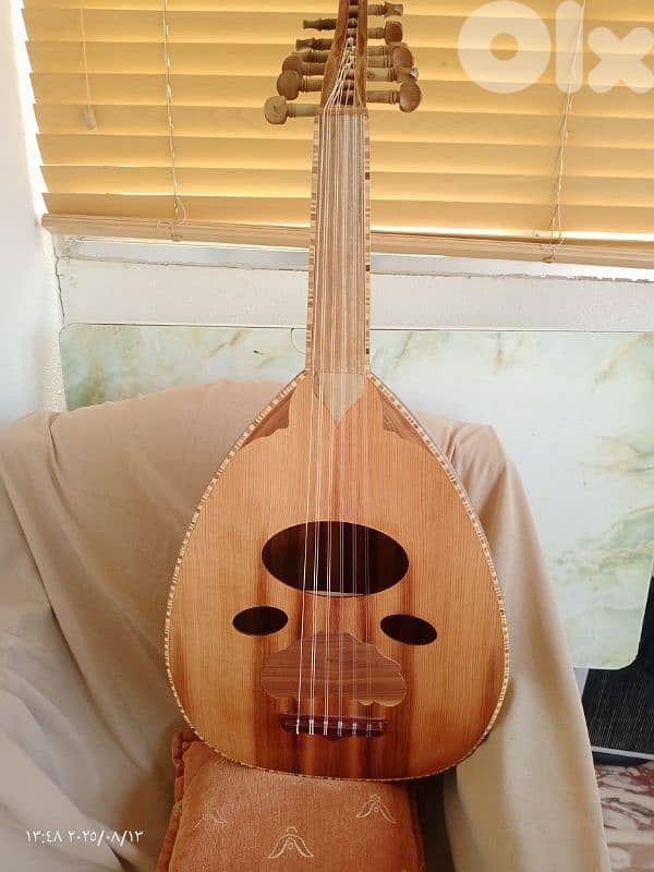 عود جديد مع حقيبة جلد وريش جميل جدا بالصوت والشكل والصناعة بسعر مناسب 7