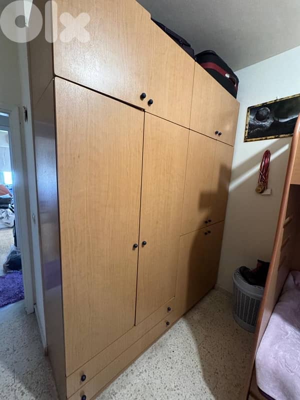 bedroom closet and beds 5