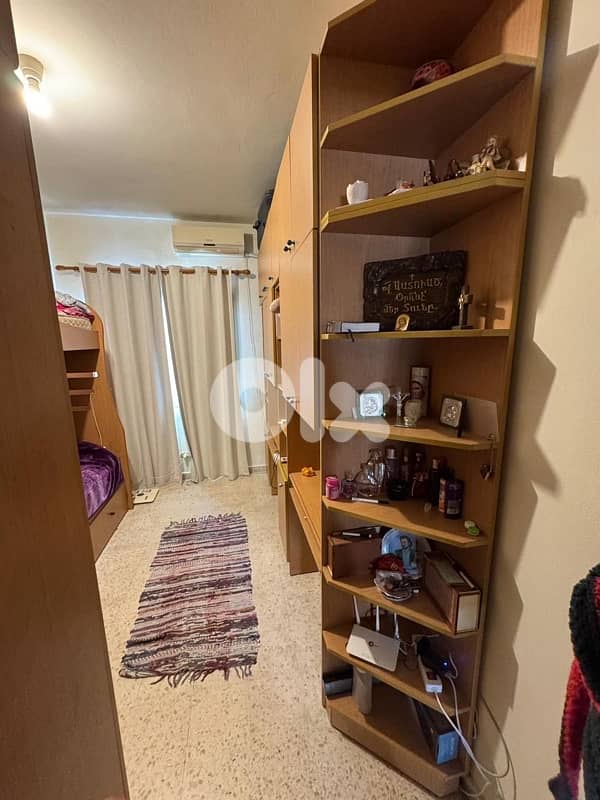 bedroom closet and beds 7