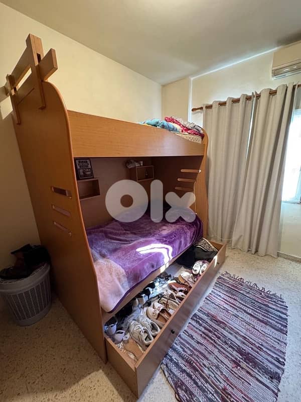 bedroom closet and beds 8