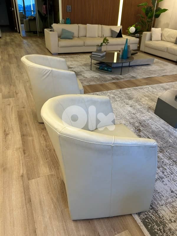 2x modern sleek arm chairs 1