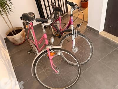two adults bicycle