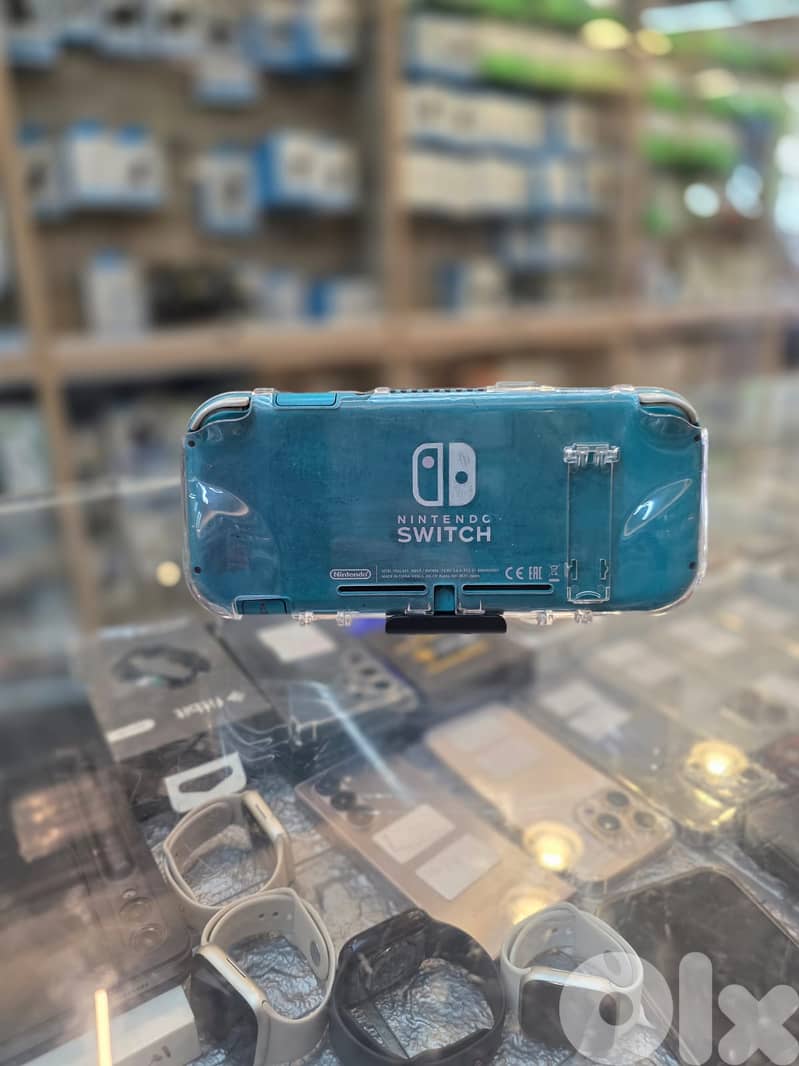 Used  nintedno switch lite  turquoise 100$ 1