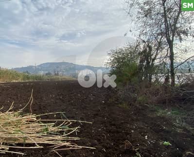 للبيع أرض في حلبا بمساحة 8,000 متر تقع مباشرة على الشارع. REF#SM130157