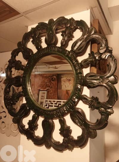 carved jade mirror with gold patina