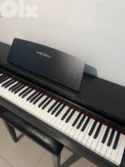 electric piano for sale + FREE chair